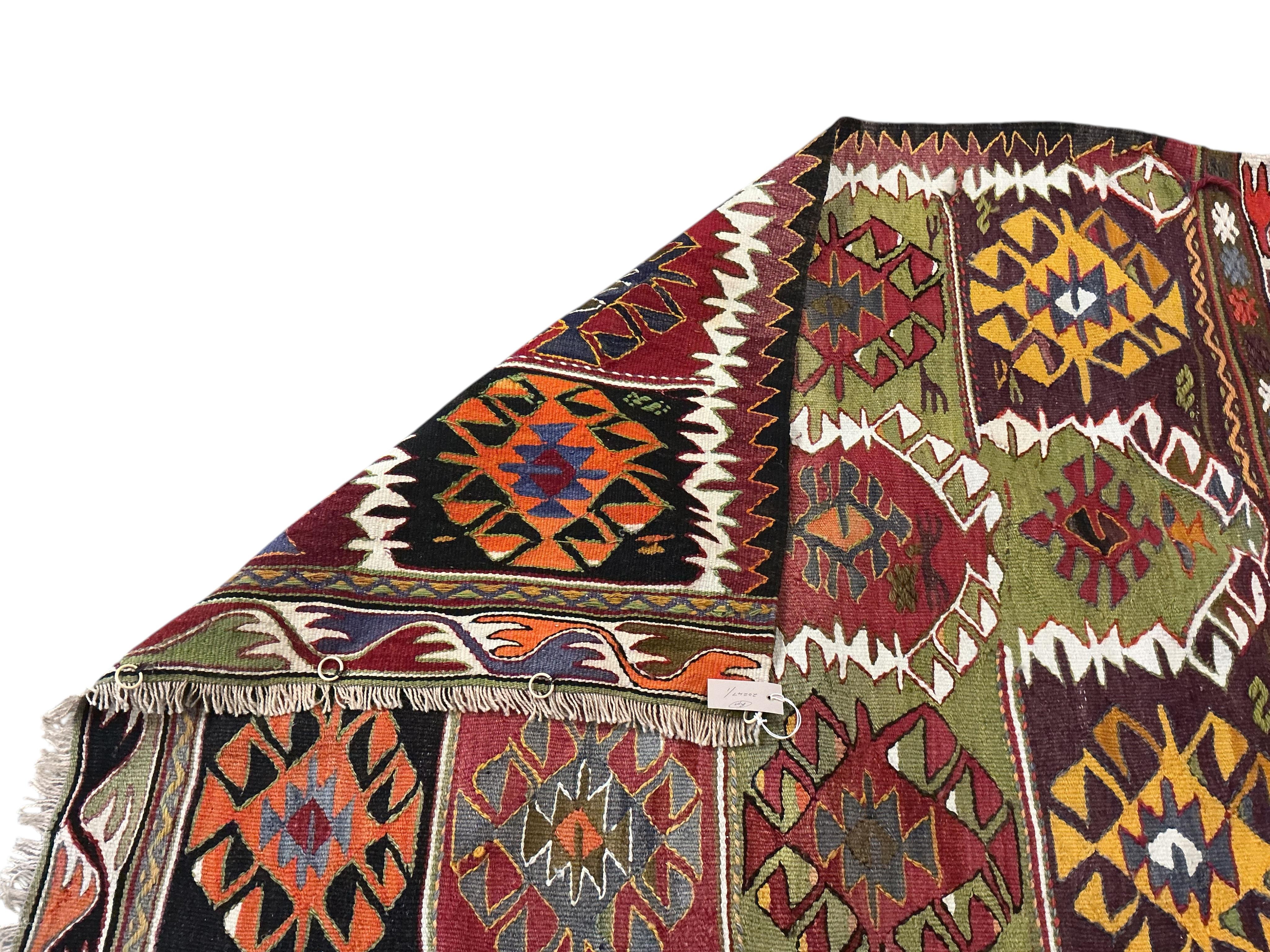 A Kilim polychrome flatweave rug, 140 x 105cm